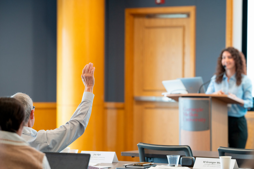 attendee raising hand