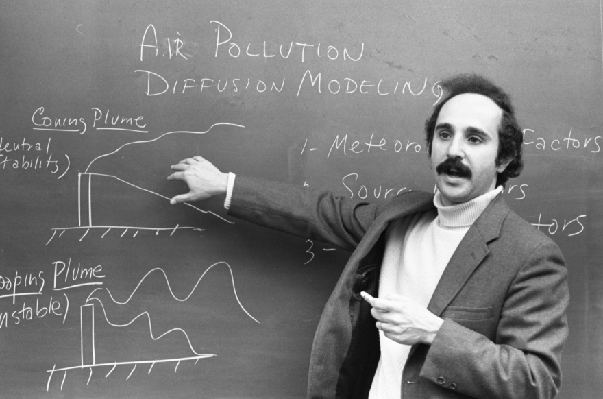 young rubin teaching at a blackboard